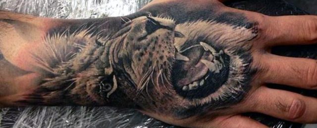 40 Löwen Hand Tattoo Designs für Männer Noble Ink Ideen Mann Stil
