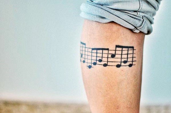 75 Musik Hinweis Tattoos für Männer - Auditive Ink Design-Ideen  