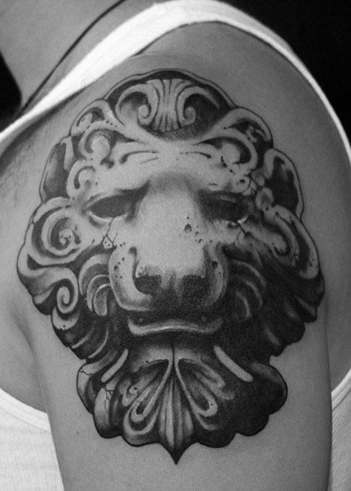 40 Löwen Statue Tattoo Designs für Männer - geschnitzte Stein Tinte Ideen  