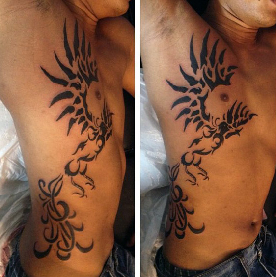 40 Tribal Phoenix Tattoo-Designs für Männer - Mythologie Tinte Ideen  