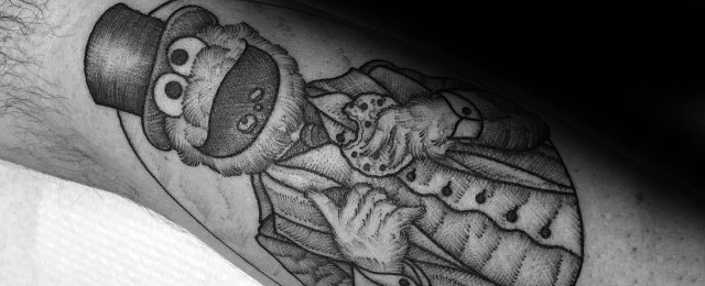 30 Krümel Monster Tattoo Designs für Männer Muppet Ink Ideen Mann
