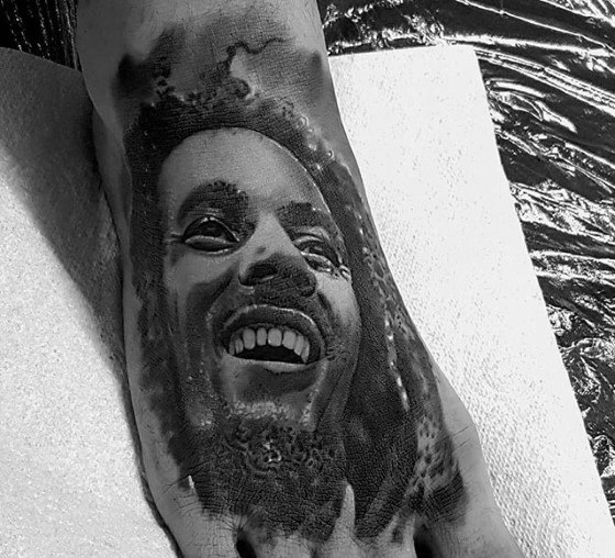 60 Bob Marley Tattoos für Männer - jamaikanische Design-Ideen  