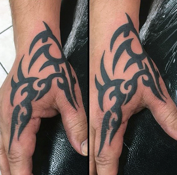 40 Tribal Hand Tattoos für Männer - Manly Ink Design-Ideen  